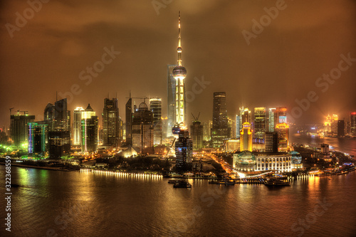 Nocturne view of modern Pudong financial district in Shanghai.