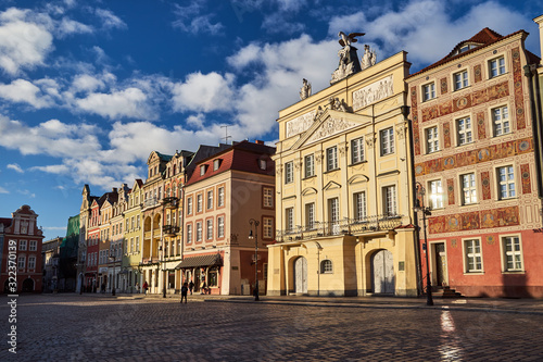 Old market square with historic tenement houses in Poznan..