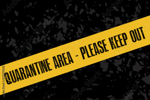 A yellow quarantine sign or tape on a dark background