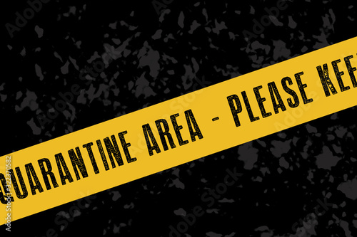 A yellow quarantine sign or tape on a dark background