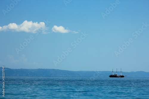 yacht on the blue sea in summer in Greece © Kostia