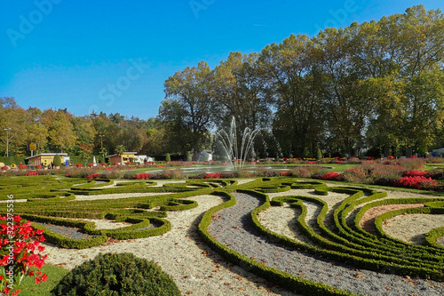 Hedge maze with fountain in background