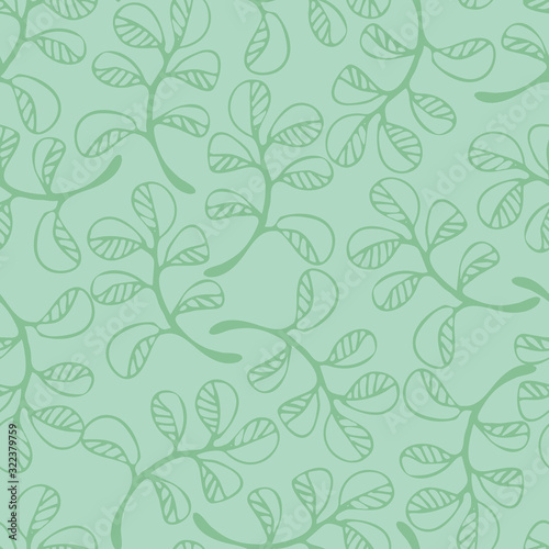 Simple doodle leaves seamless vector pattern in pale green colors. Minimal nature themed surface print design. © rysunki.malunki