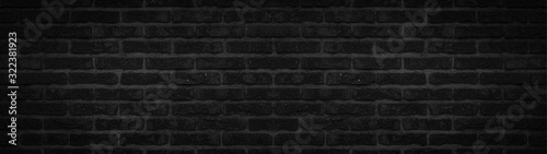Dark black anthracite rustic brick wall texture banner panorama