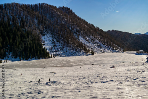 Snowy view at Calaita lake, Siror - Trentino Alto Adige photo