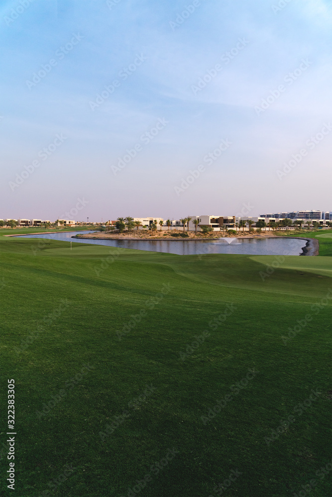 Stunning panoramic view of the green golf course in Dubai, UAE Stunning panoramic view of the green golf course in Dubai, UAE