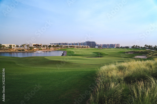 Stunning panoramic view of the green golf course in Dubai, UAE 