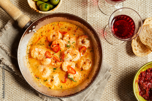Pan of spicy scampi tails sauteed with garlic