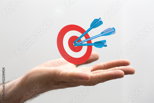 dart target arrow hitting on bullseye which is the ultimate goal that everyone wants.