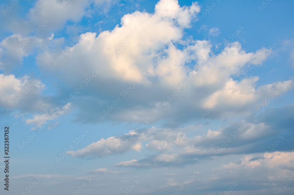 Very beautiful white clouds on a background of blue sky