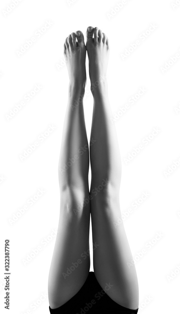 Beautiful female legs upside down.
