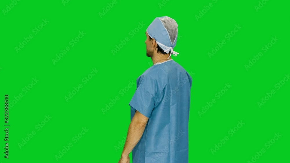 Medic doing slides and taps on virtual display against green screen