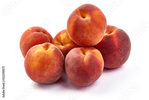 Fresh ripe juicy peaches, isolated on white background