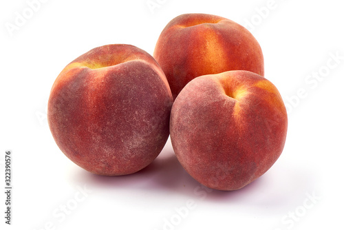 Fresh ripe juicy peaches  isolated on white background