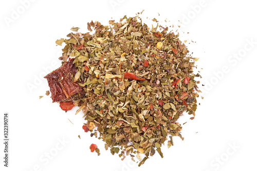 Close-Up macro of dried blend Italian Seasoning mix, grated herbs and spices for cooking, isolated on white background