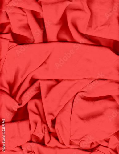 Crumpled, wrinkled cotton T-shirt fabric in light red