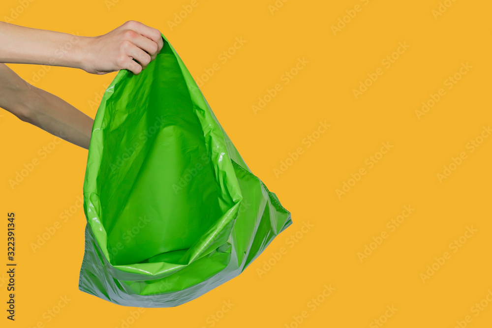 Men's hands hold the bag