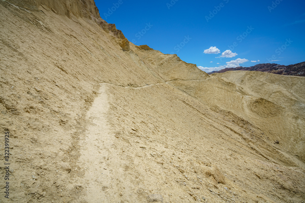 hikink the golden canyon - gower gulch circuit in death valley, california, usa