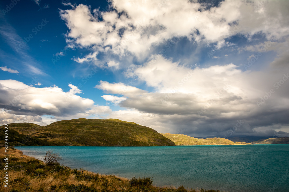 Landscape view on turquoise water of Lake Pehoe in Torres Del Paine, Patagonia, Andes, Chile. 