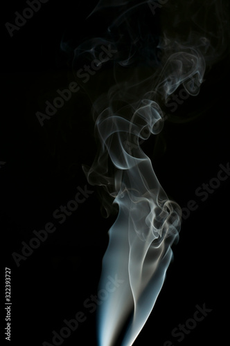 White Smoke on black background, smoke background, abstract smoke texture.