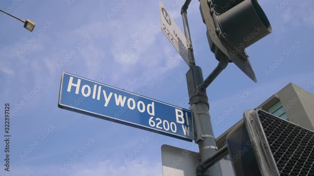 Hollywood boulevard street sign and traffic lights in 4k in slow motion 60fps