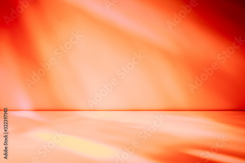 Artistic studio wall background in tones of red and orange