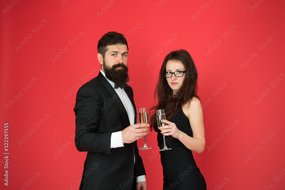 Occasion to celebrate. Couple in love drink sparkling wine. Attractive woman bearded man raise glasses. Family celebrate Valentines day. Romantic relationship. Love concept. Celebrating their love Occasion to celebrate. Couple in love drink sparkling wine. Attractive woman bearded man raise glasses. Family celebrate Valentines day. Romantic relationship. Love concept. Celebrating their love