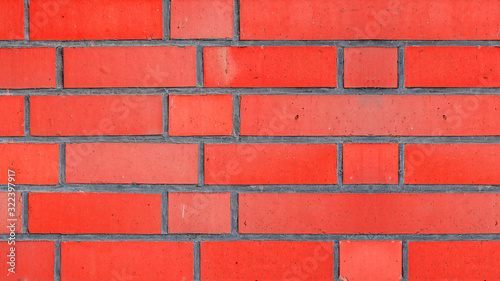 Fire red rustic brick wall texture  colorful trend color 2020