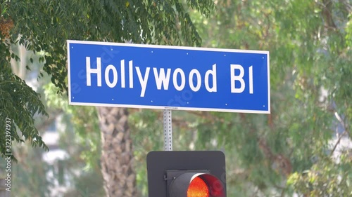 Hollywood boulevard street sign and traffic lights in 4k in slow motion 60fps