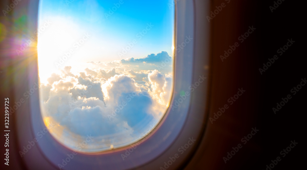 Sunrise airplane window with copy space