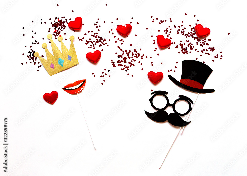 flatlay false paper photo stand props: crown lips, mustache and hearts white background copyspace for Valentine's day greeting card flatlay false paper photo stand props: crown lips, mustache and hearts white background copyspace for Valentine's day greeting card