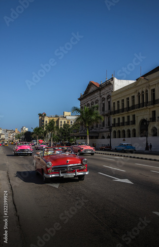 colored cars on the road in Havana