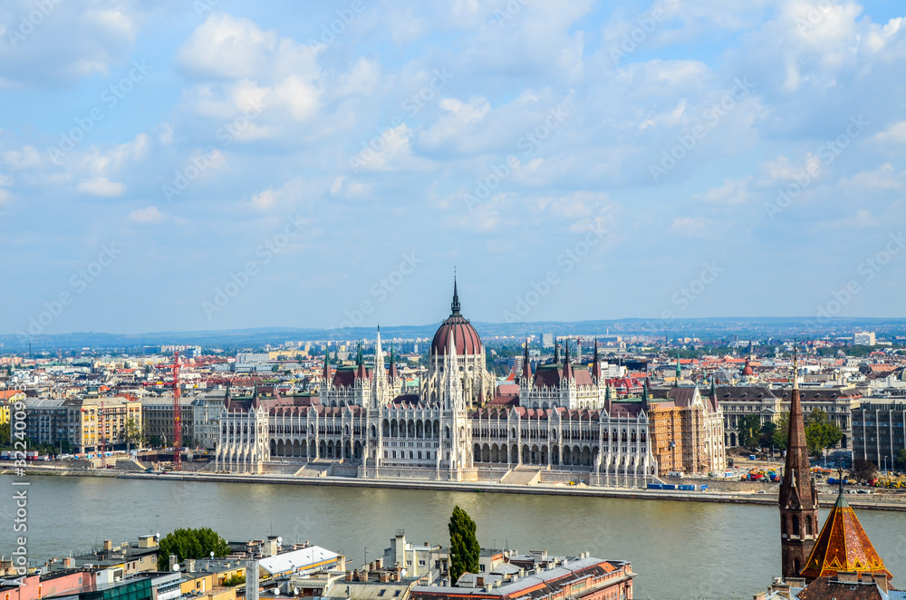 Beautiful image of the Budapest Parliament Building taken from the other side of the Danube River, Hungary