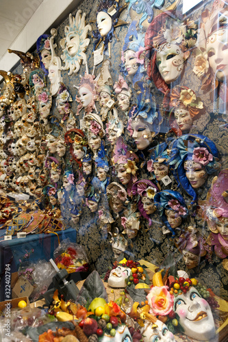 Handmade masks on a store window in Venice. Venetian masks