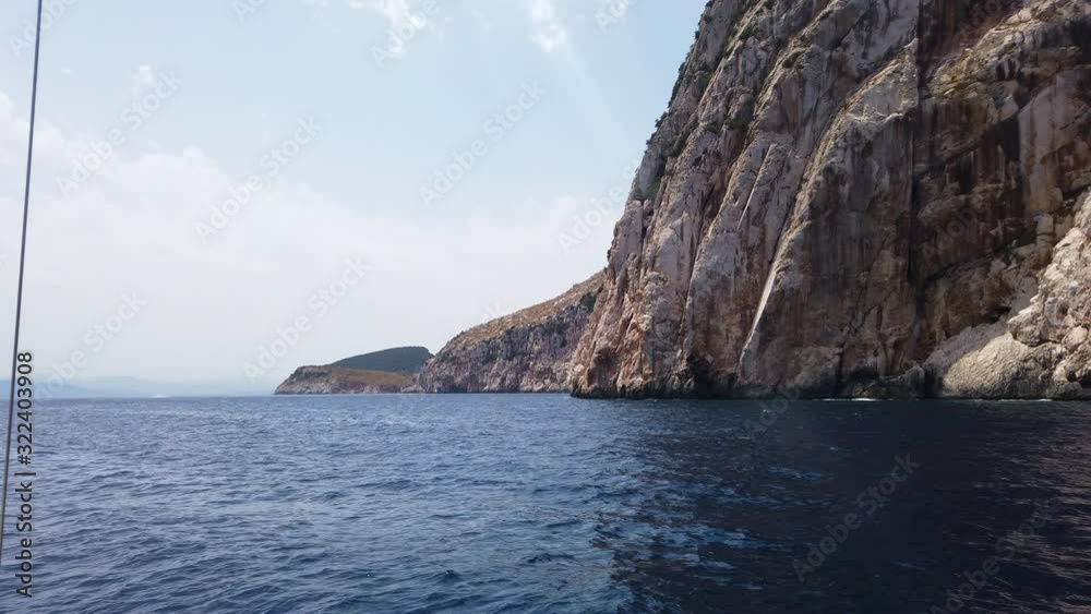 Wide shot of great waves crush to great cliff Wide shot of great waves crush to great cliff