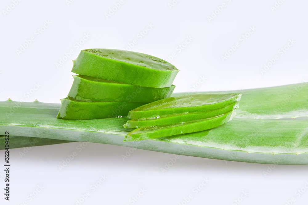 Fresh green Aloe Vera slices isolated on white background. Herbal medicine Fresh green Aloe Vera slices isolated on white background. Herbal medicine