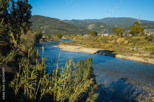 River with blue waters near Meteora in Greece photo