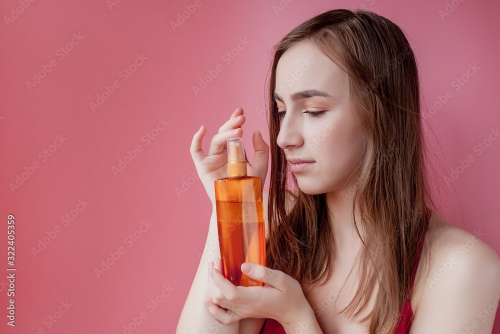 Expert tips achieve incredible hair. Protect hair before heat styling. Apply protective product first. Hair styling tips. Girl holds shampoo bottle. Woman shows beauty product for hair. Expert tips achieve incredible hair. Protect hair before heat styling. Apply protective product first. Hair styling tips. Girl holds shampoo bottle. Woman shows beauty product for hair.
