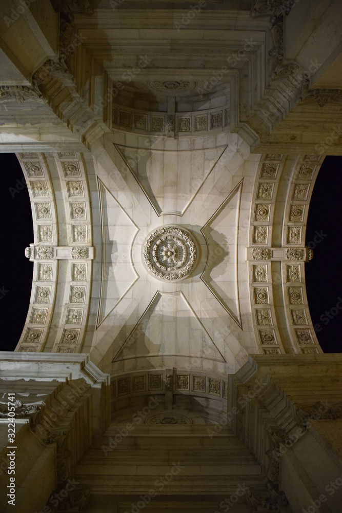 Beautiful and Artistic view of the Rua Augusta Arch in Lisbon from below at night