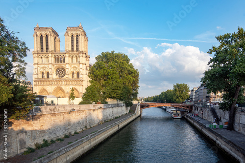 The Cathedral of Notre Dame is of Catholic worship, the seat of the Archdiocese of Paris. Dedicated to the Virgin Mary, it is located on the small island of the Cité, surrounded by the Seine River. © satur73