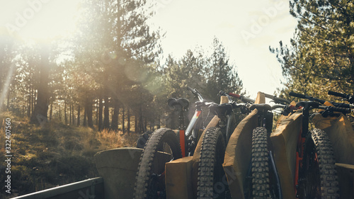 mountain bikes stacked together in shuttle