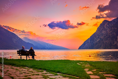 Fototapeta Naklejka Na Ścianę i Meble -  Beautiful and colorful autumn in Riva del Garda, Garda lake surrounded by mountains, Trentino Alto Adige region, Lago di garda, italy
