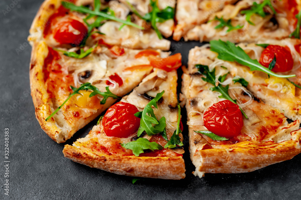 tasty italian pizza with mozzarella cheese, mushrooms, tomato, bell pepper, onion on a stone background tasty italian pizza with mozzarella cheese, mushrooms, tomato, bell pepper, onion on a stone background