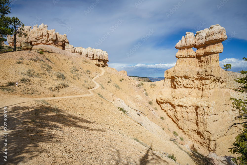 hiking the rim trail in bryce canyon national park, utah, usa hiking the rim trail in bryce canyon national park, utah, usa