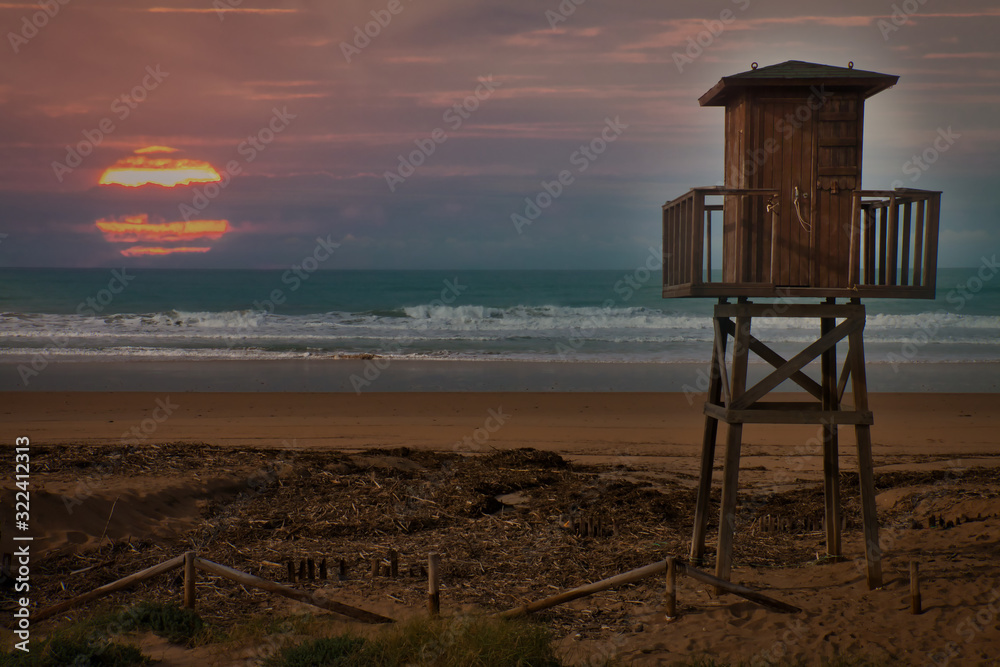 Sunset on the beach of El Palmar, on the coast of the province of Cadiz, in Andalusia, southern Spain