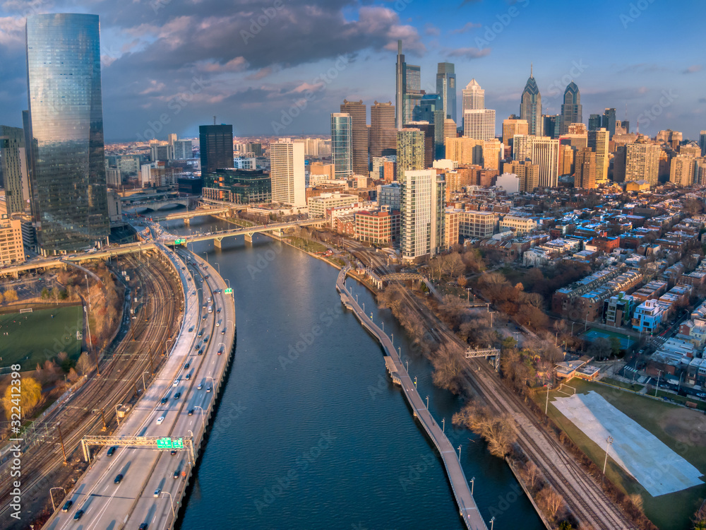 Philadelphia skyline, aerial view of downtovn Philly with skyscrapers in dramatic light and cloudscape, Schuylkill riverfront
