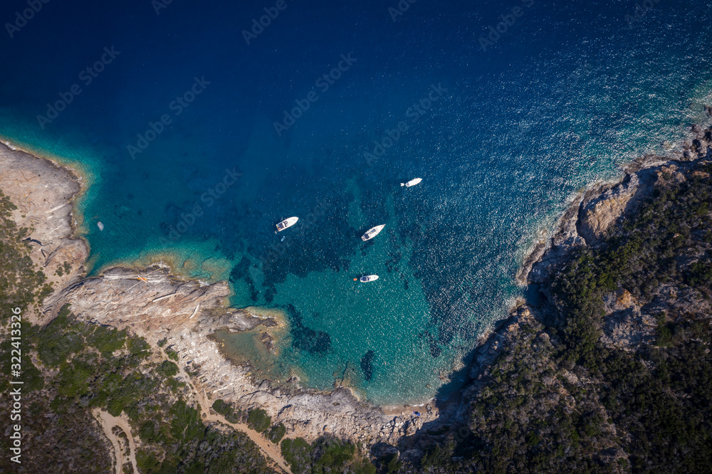 Italy, Province of Livorno, Elba, Aerial view of boats floating in blue coastal water Italy, Province of Livorno, Elba, Aerial view of boats floating in blue coastal water