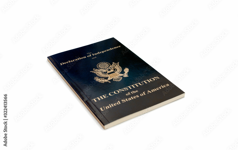 high angle view of booklet with constitution of usa isolated on white