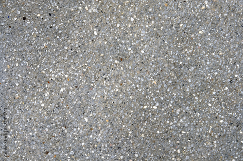 Explsed aggregate finish concrete wall and floor background texture. photo