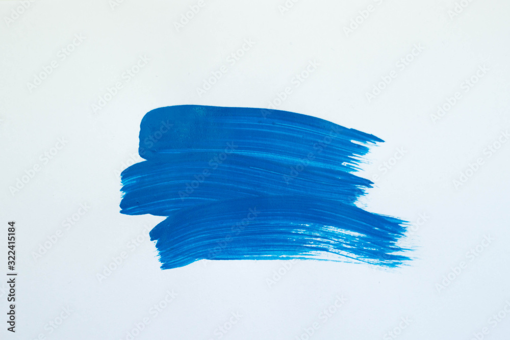 Abstract brushstroke. Beautiful textured blue stroke isolated on a white background. Acrylic paint.